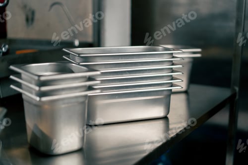 Preview: In the restaurant’s kitchen there are cook’s metal basins the shelf washed