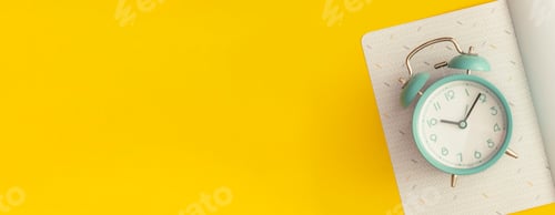 Preview: Notebook, alarm clock on yellow background. Top view. Back to school concept.