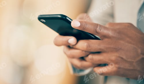 Preview: My digital diary. Shot of an unrecognizable businessperson using a phone at work.