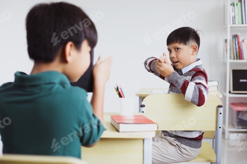 Preview: Elementary students playing in the classroom