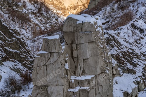Preview: Snow covered stone figure in gorge