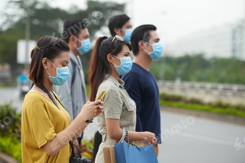 Preview: Asian pedestrians in protective masks