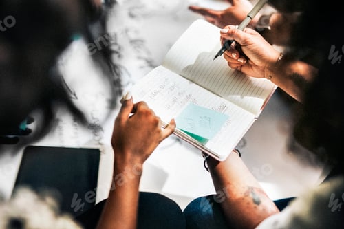 Preview: Hand writing on a notebook