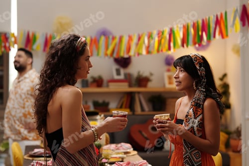 Preview: Girls with drinks having conversation