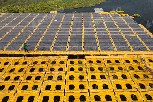 Preview: Aerial View of Solar Panel Array on Water