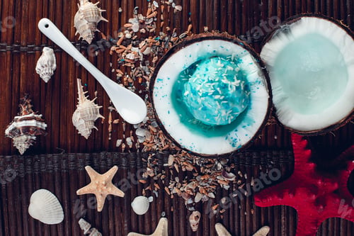 Preview: Blue ice cream in coconut bowl.