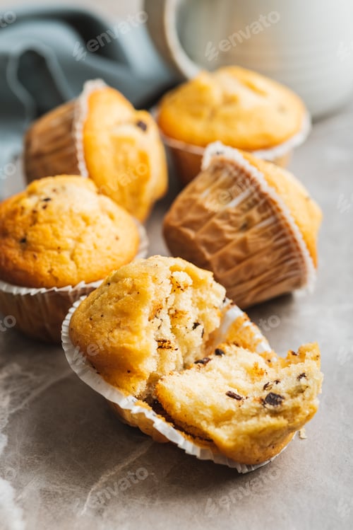 Preview: Sweet vanilla muffins on kitchen table.
