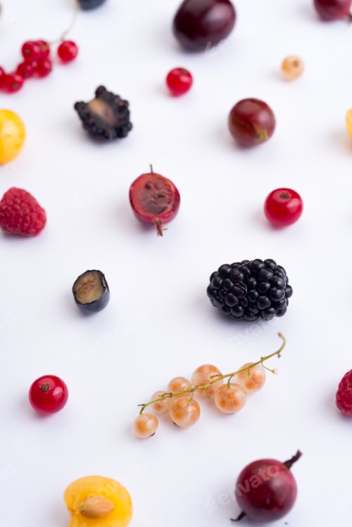 Preview: Berries isolated over white background table.