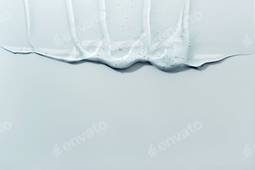 Preview: Liquid gel abstract cosmetic blue background. Smear of transparent moisturizing product