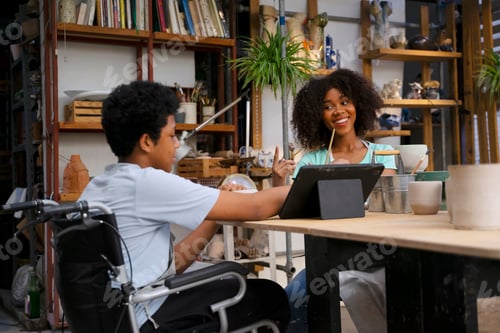 Preview: Disability man are making earthenware at workshop.