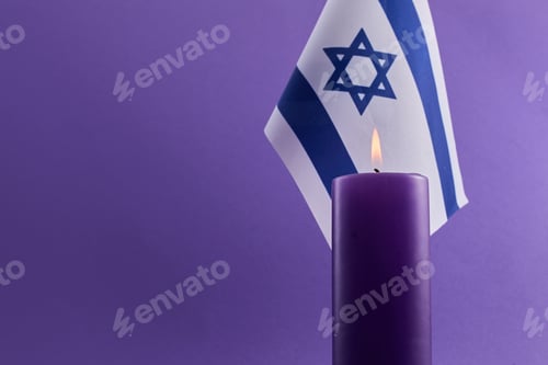Preview: Holocaust memorial day. Candle and Flag