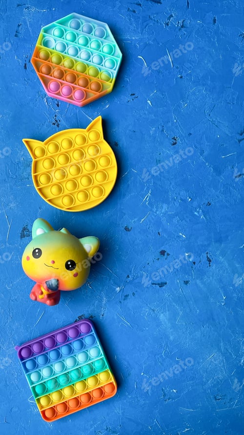 Preview: Rainbow Square Cat shape Fidget Toys Pop-it on the gray background. Push Pop Bubble. Popular Relax