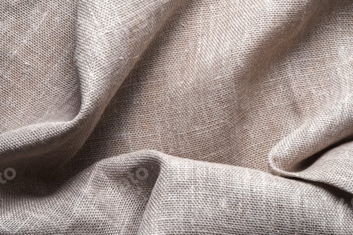 Preview: Background of linen napkin folded in folds