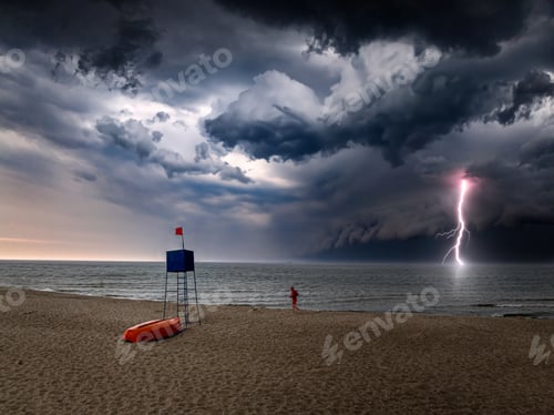 Preview: Running lifeguard and lifeguard tower during storm, Baltic Sea