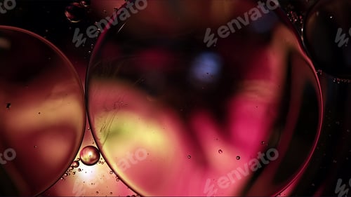 Preview: Abstract Colorful Food Oil Drops Bubbles and spheres Flowing on Water Surface