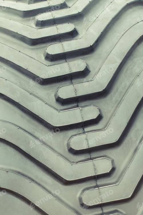 Preview: Black tyre using in vehicle, tractor or other machine. Transportation