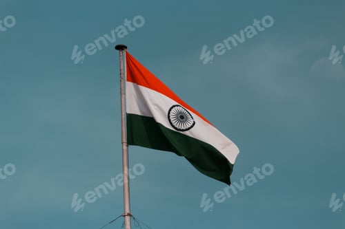 Preview: Closeup of the India flag waving in the blue sky, cool for background