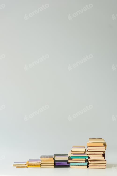 Preview: steps made of vintage books isolated on grey