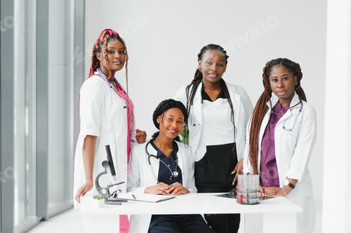 Preview: group of young african medical workers on white background.