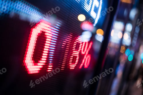 Preview: Stock market quotes with city scene reflect on glass