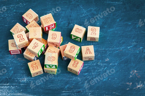 Preview: Alphabet blocks ABC on wooden table. creative photo