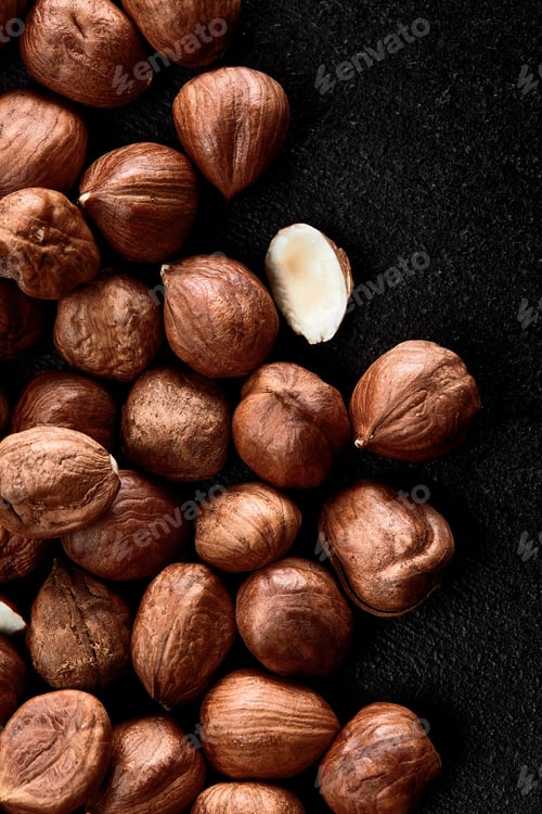 Preview: Close up of Hazelnut kernels - Food Frame Background, macro detailed close up.
