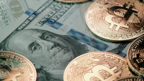Preview: Bitcoin, crypto currency. Golden coins on bills of usd, dollars. Digital exchange, popularity of BTC