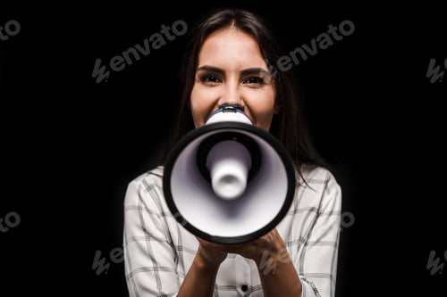 Preview: cheerful woman holding megaphone isolated on black