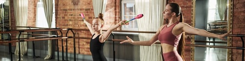 Preview: Teenager Girl and Young Adult Woman Practicing Rhythmic Gymnastics Training