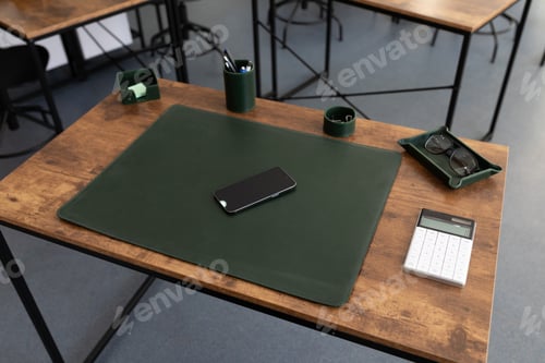 Preview: desktop in the office with a green leather pad