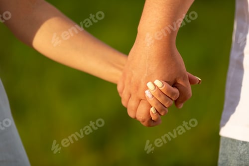 Preview: A man and a woman holding hands