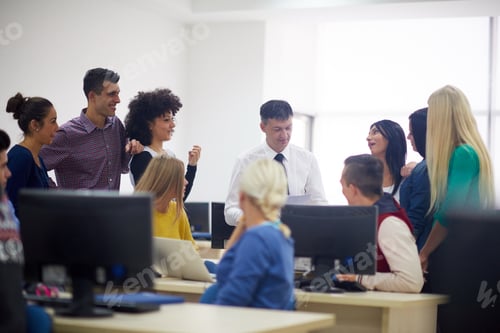 Preview: Group Of Students With Teacher In Computer Lab Classrom Learrning Lessons, Get Help And Support