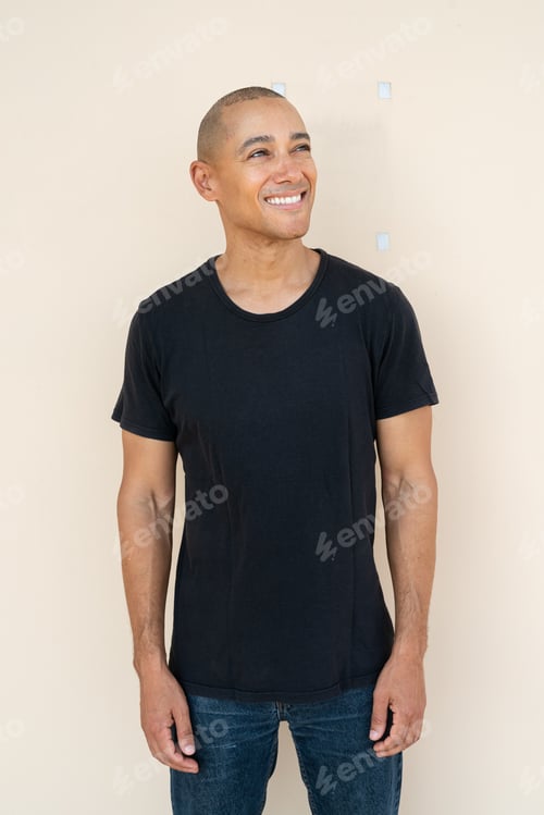 Preview: Portrait of handsome bald man smiling and thinking