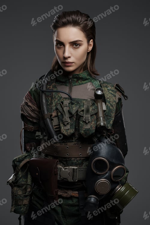 Preview: Portrait of a woman in military attire against a gray background
