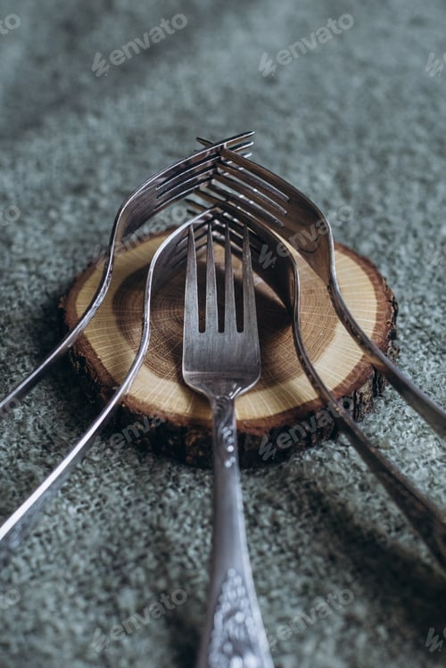 Preview: set of silver forks on the table