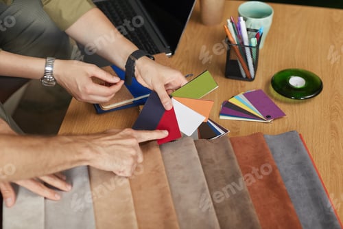 Preview: Fashion designers examining samples