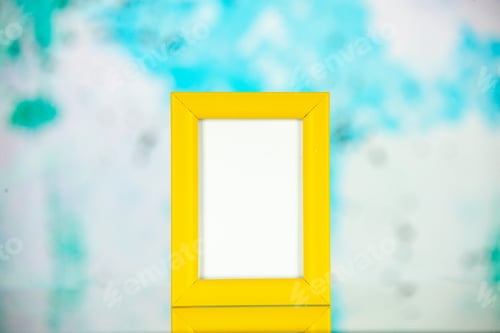 Preview: front view yellow picture frame on a light blue background portrait photo color shoot present family