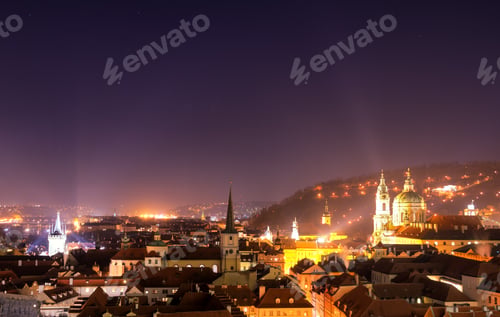 Preview: Lesser Town and Tower of St Nicholas Church during clear night. Prague, Czech republic.