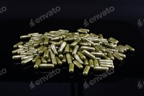 Preview: Closeup shot of medical pills on a dark background