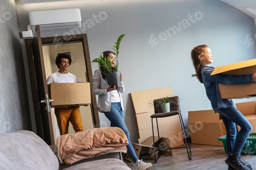 Preview: Mixed race family moving into their new home.