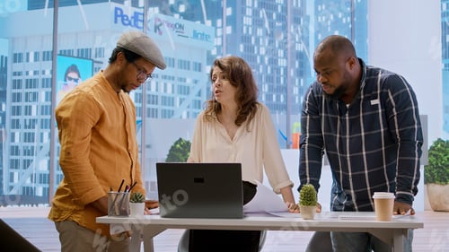 Preview: Business professionals and a real estate agent engage in a planning session