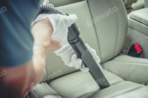 Visualização: Limpeza de assentos de carro com vácuo em um lava-jato