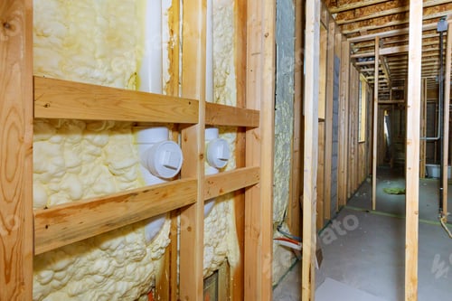 Preview: Wall of a basement thermal hydro insulation with spray foam at house construction