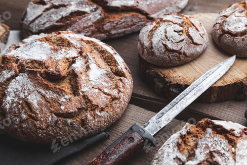 Preview: Delicious fresh bread on wooden background