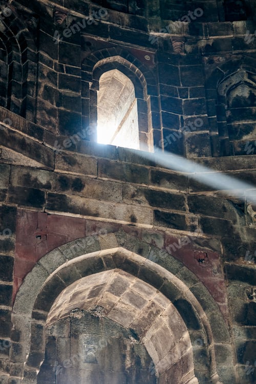 Preview: Beam of light from window of ancient indian tomb Bada Gumbad in New Delhi, India, white ray of light