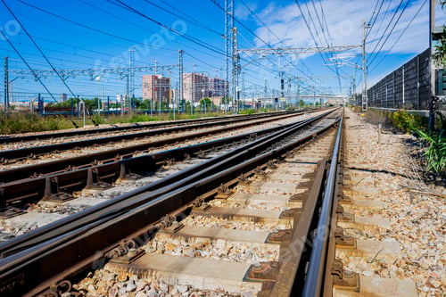 Preview: Valencia, Spain - April 16, 2021: Electrified multi-lane railroad near the Spanish city of Valencia.