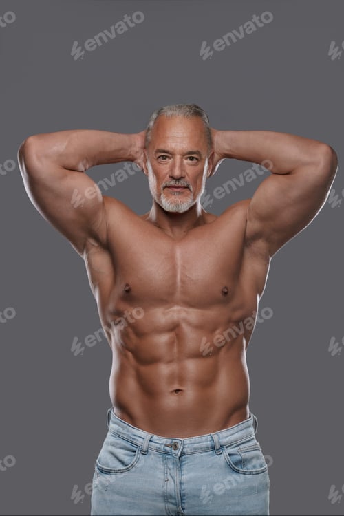 Preview: This attractive mature muscular man with a stylish salt and pepper beard