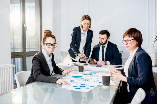 Preview: Business people during the conference in the office