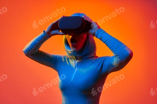 Preview: Futuristic woman in VR glasses screaming