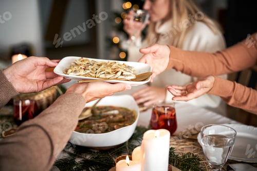 Preview: Family sharing the food at the Christmas Eve